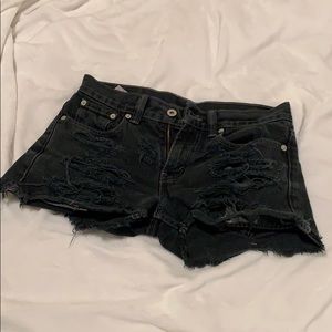 ripped levi’s jean shorts